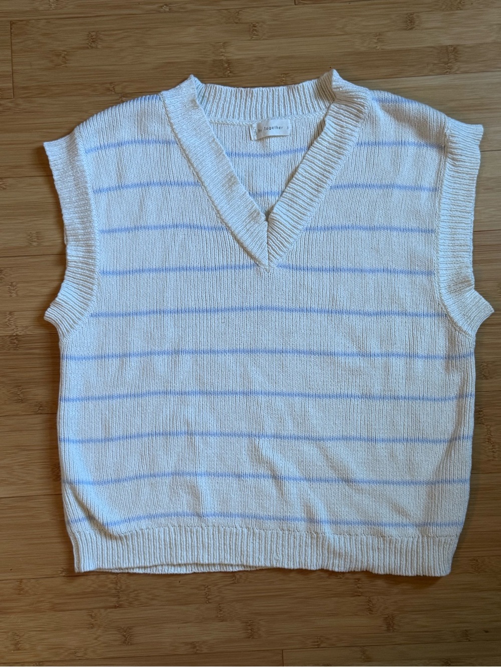 Boutique White Sleeveless V-Neck Sweater Vest with Light Blue Stripes
